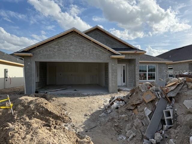 property under construction featuring a garage