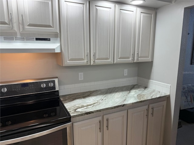 kitchen featuring white cabinetry, black electric range oven, exhaust hood, and light stone counters