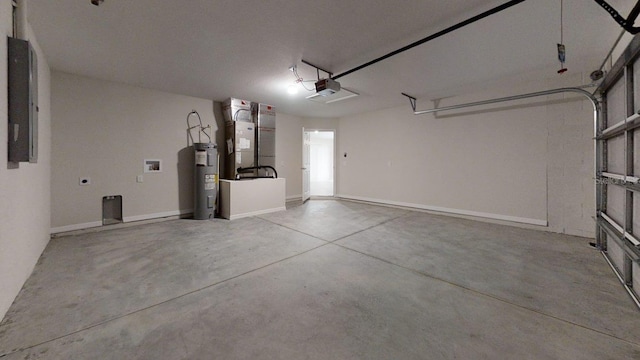 garage featuring water heater, a garage door opener, and heating unit