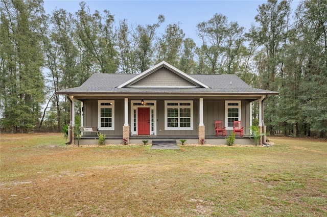 view of front of home with a front lawn and covered porch