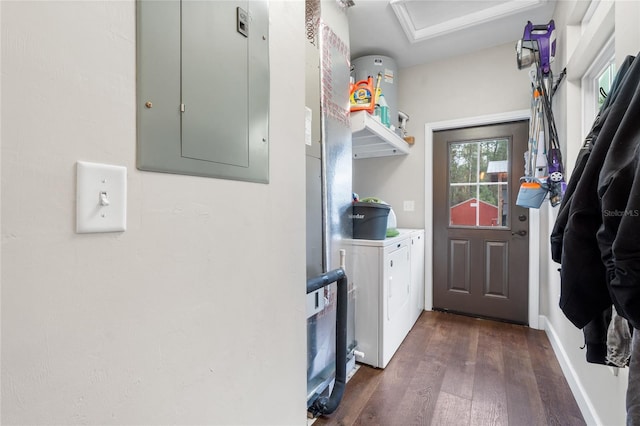 laundry room with separate washer and dryer, dark hardwood / wood-style flooring, and electric panel