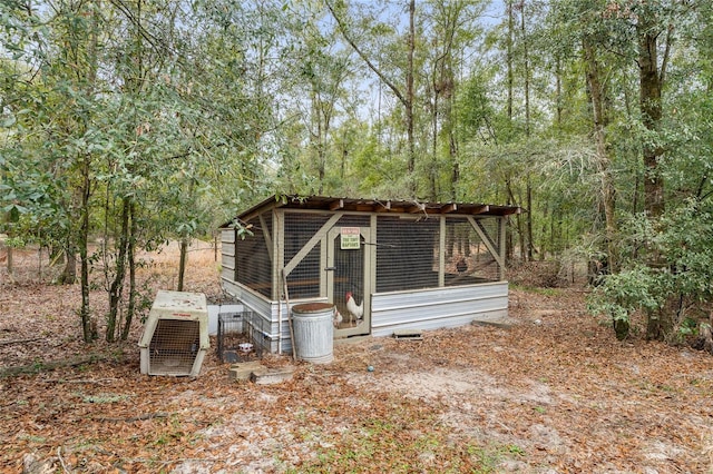 view of outbuilding with central air condition unit