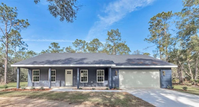 ranch-style house with a porch and a garage