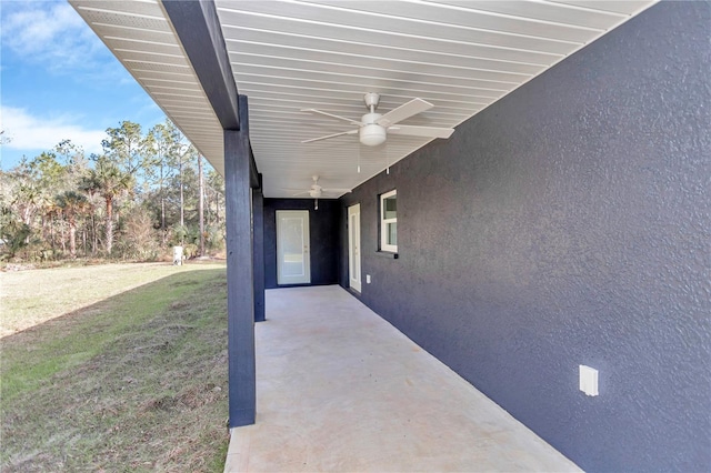 view of patio with ceiling fan