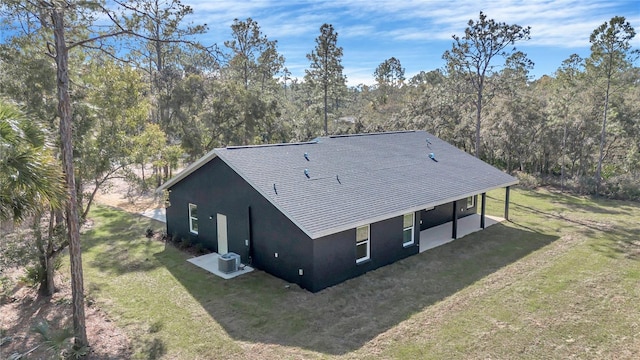 drone / aerial view with a forest view