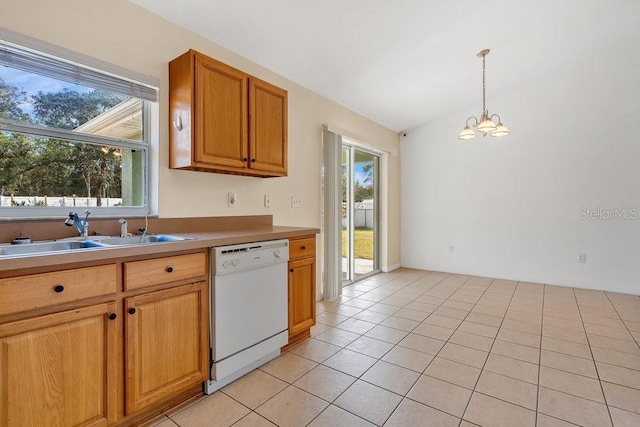 kitchen featuring white dishwasher, sink, decorative light fixtures, light tile patterned flooring, and a chandelier