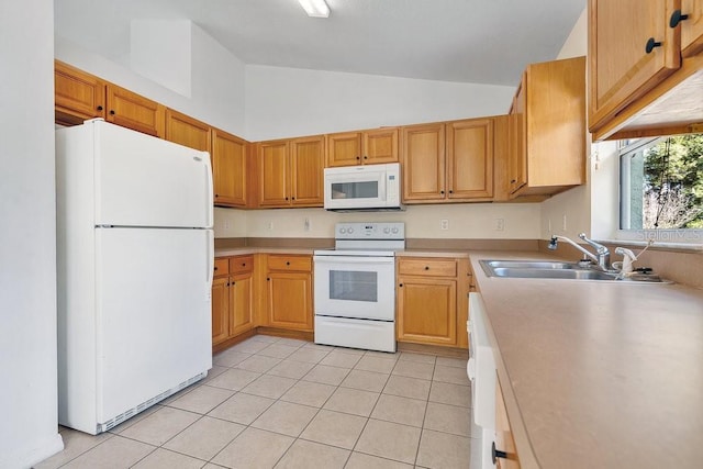 kitchen featuring high vaulted ceiling, white appliances, sink, and light tile patterned floors