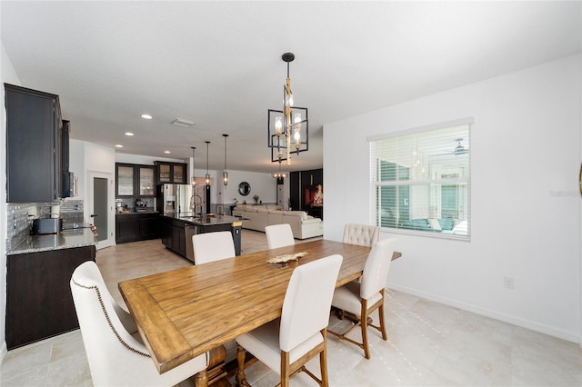 dining space featuring sink