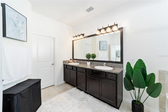 bathroom featuring vanity and tile patterned floors