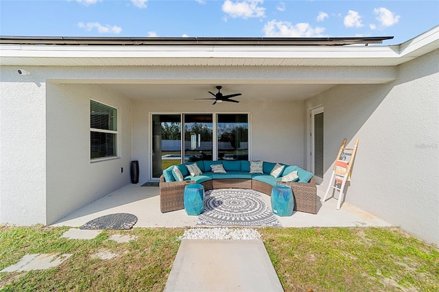 view of patio featuring an outdoor living space and ceiling fan