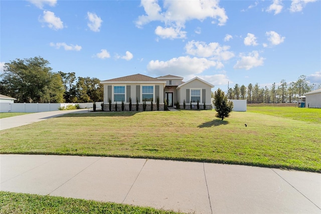 view of front of home with a front yard