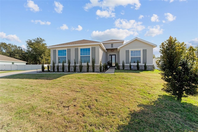 view of front of home with a front lawn