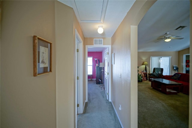 corridor featuring carpet flooring