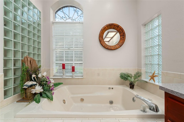 bathroom with tiled tub