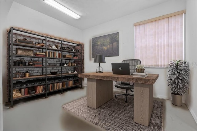 office featuring concrete flooring