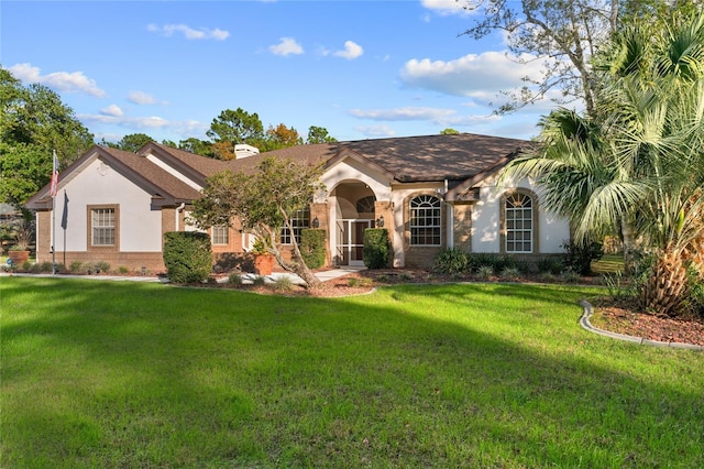 ranch-style house with a front yard