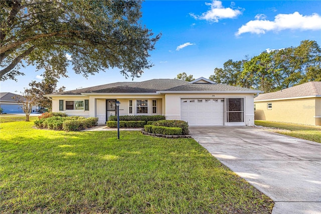 ranch-style home with a front yard and a garage