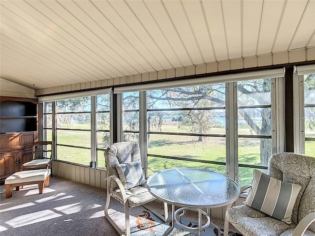 sunroom / solarium with lofted ceiling