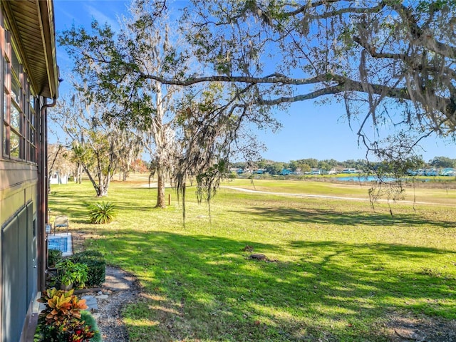 view of yard with a water view