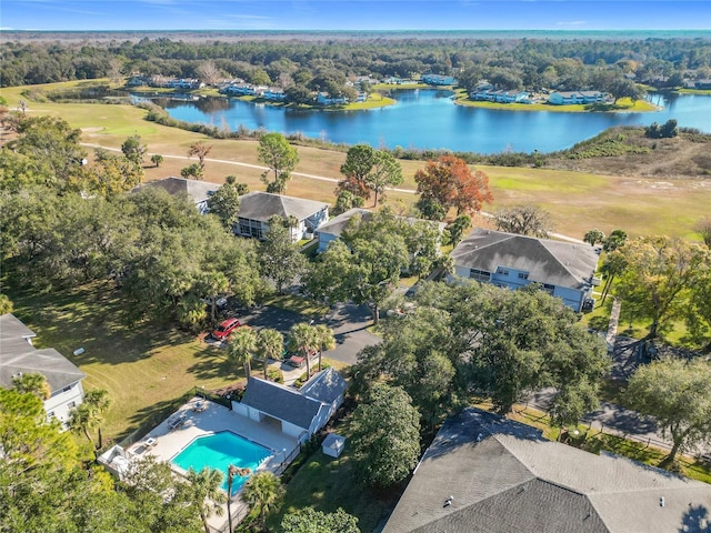 birds eye view of property with a water view