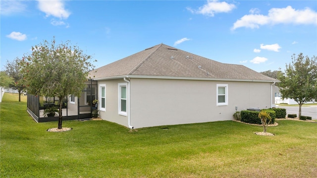 view of property exterior featuring a yard