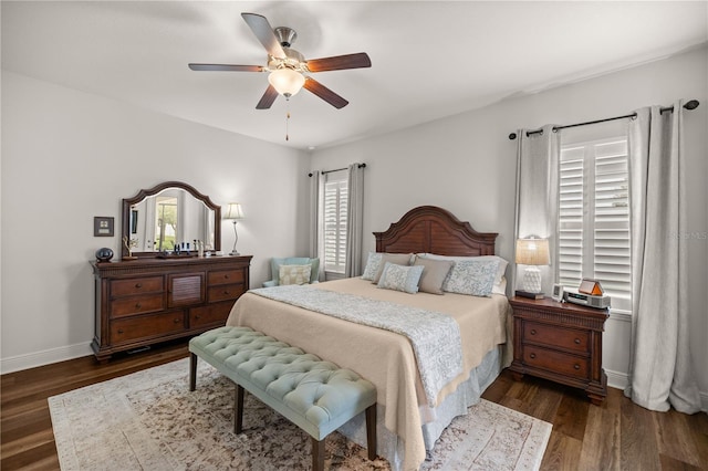 bedroom featuring ceiling fan and dark hardwood / wood-style floors