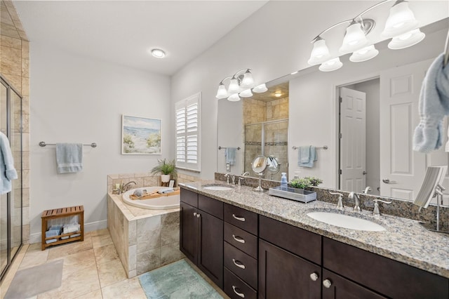 bathroom with vanity and separate shower and tub