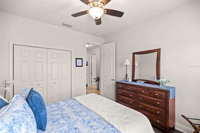 bedroom with a closet and ceiling fan