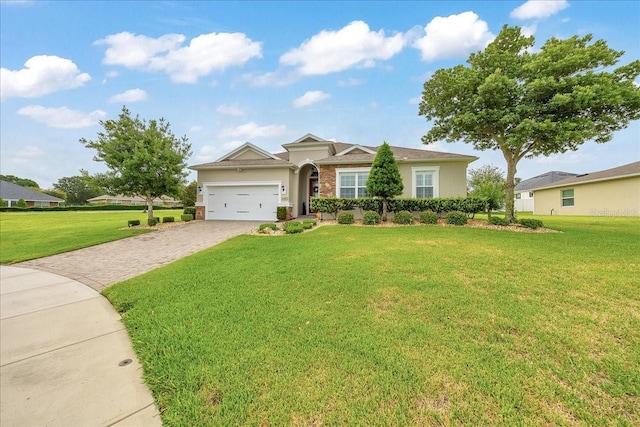 6407 SW 45th Ave, Ocala, FL 34474 - single story home with decorative driveway, an attached garage, a front lawn, and stucco siding