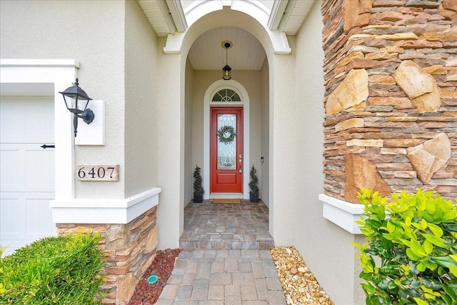 6407 SW 45th Ave, Ocala, FL 34474 - doorway to property with stucco siding and stone siding