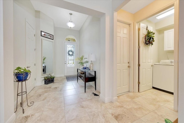 6407 SW 45th Ave, Ocala, FL 34474 - foyer with washer / clothes dryer and baseboards