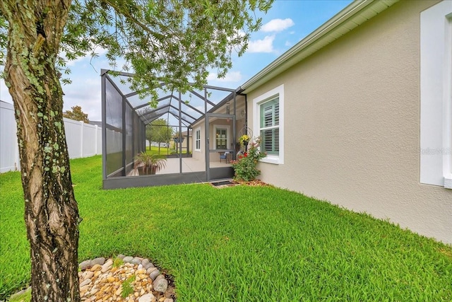 6407 SW 45th Ave, Ocala, FL 34474 - view of yard featuring a lanai and a patio area