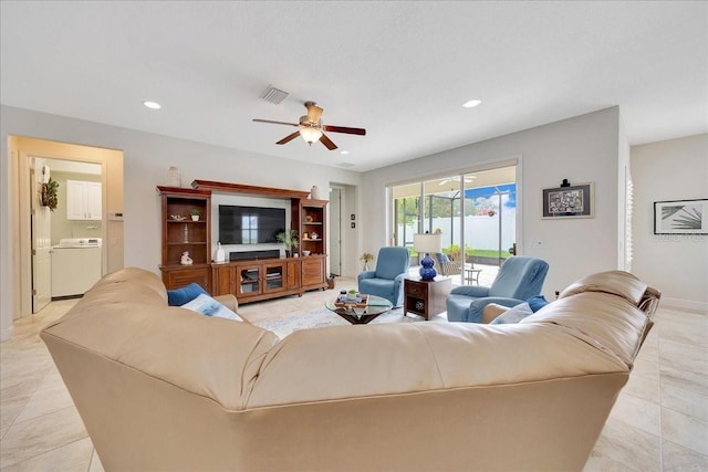 6407 SW 45th Ave, Ocala, FL 34474 - living room featuring washer / dryer, ceiling fan, recessed lighting, light tile patterned flooring, and baseboards