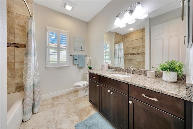 6407 SW 45th Ave, Ocala, FL 34474 - bathroom with vanity, toilet, baseboards, and shower / tub combo