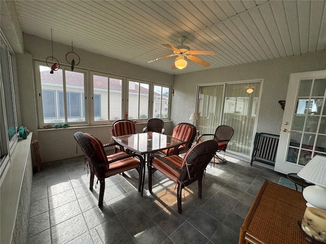 sunroom / solarium with ceiling fan