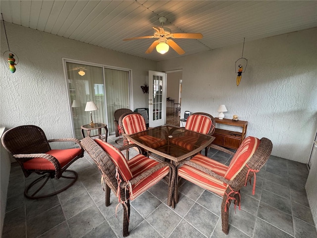 dining space with ceiling fan