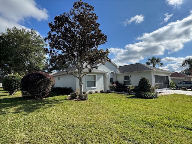 single story home featuring a front yard