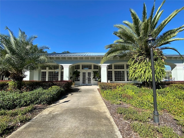 entrance to property featuring french doors