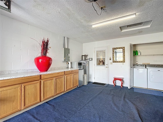 garage featuring washer and dryer and electric panel