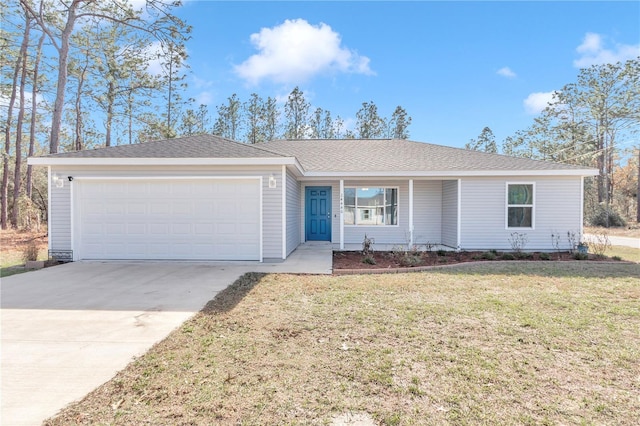 ranch-style house with a garage and a front lawn