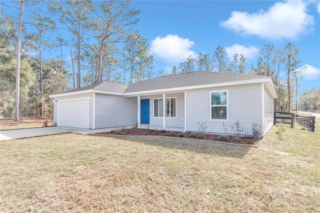 single story home featuring covered porch, a garage, and a front lawn