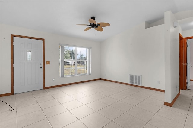 entrance foyer featuring ceiling fan and light tile patterned flooring