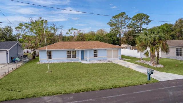 single story home with a front yard