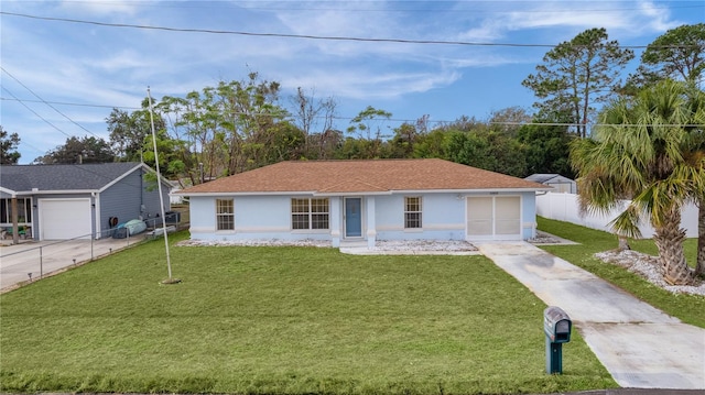 single story home featuring a front yard