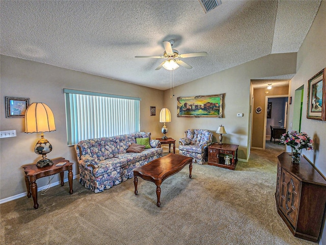 carpeted living room featuring ceiling fan, lofted ceiling, and a textured ceiling