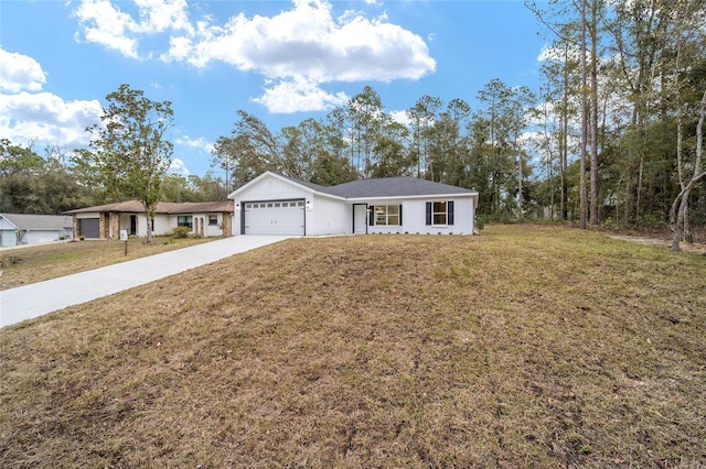 ranch-style house featuring a garage and a front lawn