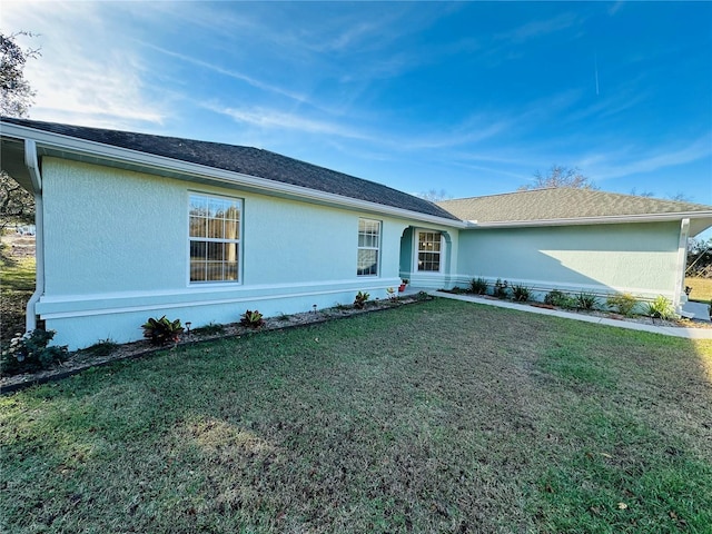 single story home with a front yard