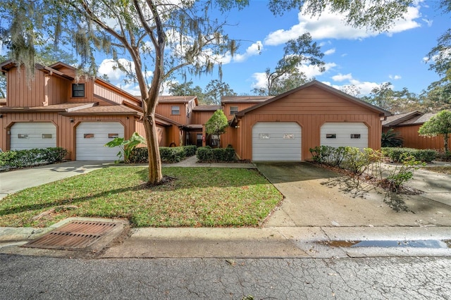 view of front facade with a front lawn and a garage