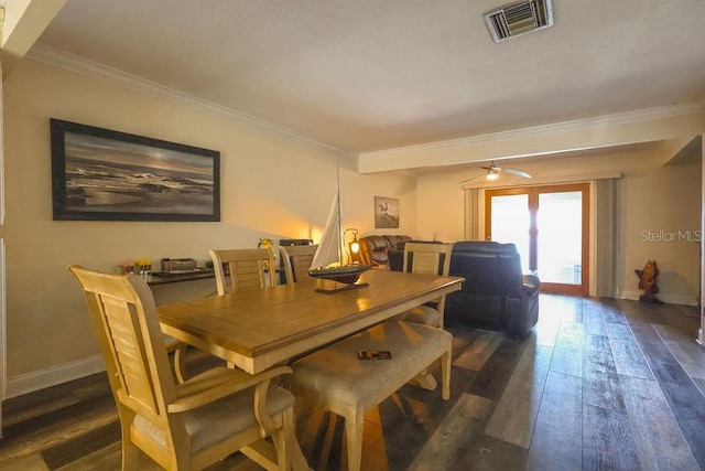 dining area featuring ornamental molding, dark hardwood / wood-style floors, and ceiling fan