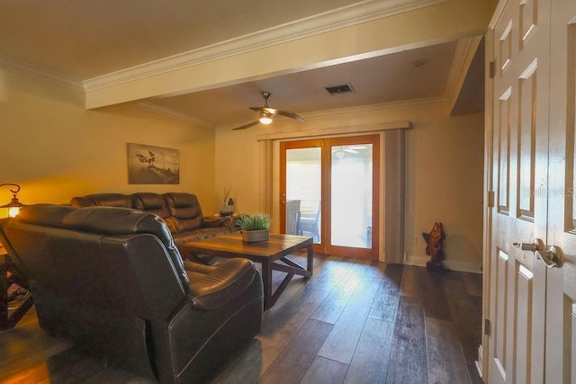 living room with ceiling fan, crown molding, and dark wood-type flooring